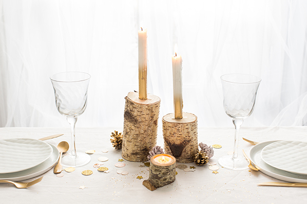 Tree branch candle holder for a Christmas table